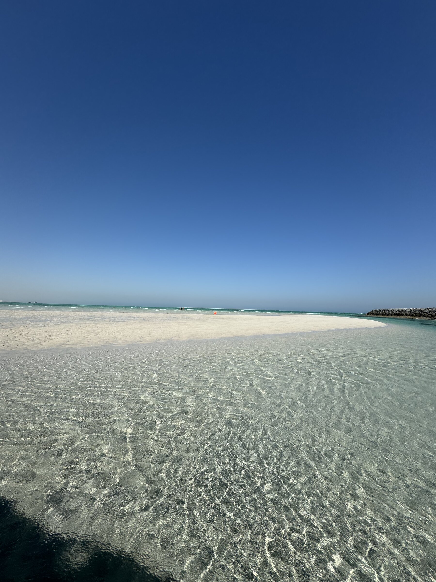 Deep turquoise around a sandbank
