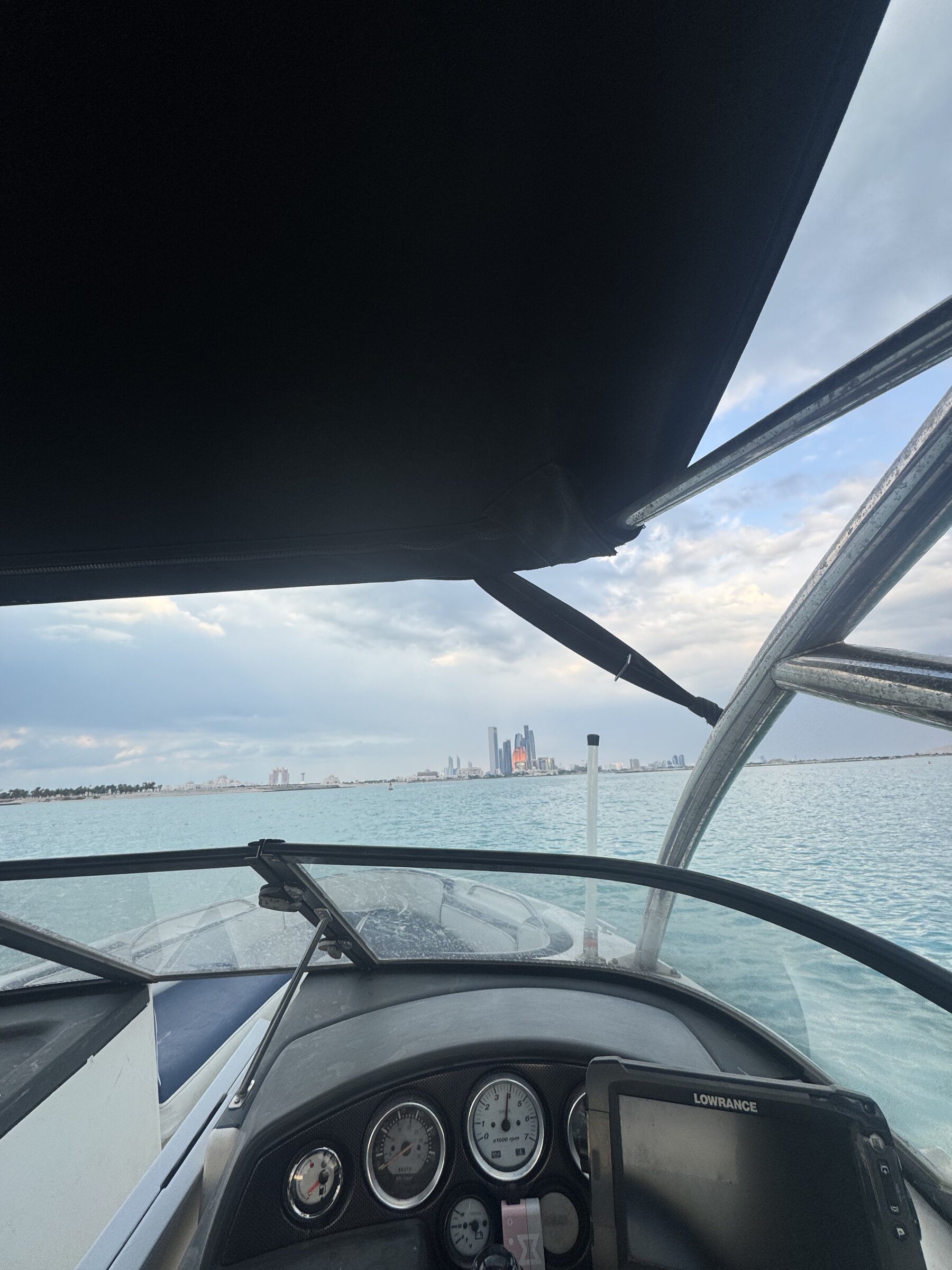 At the helm of the CLUPEA boat off Abu Dhabi