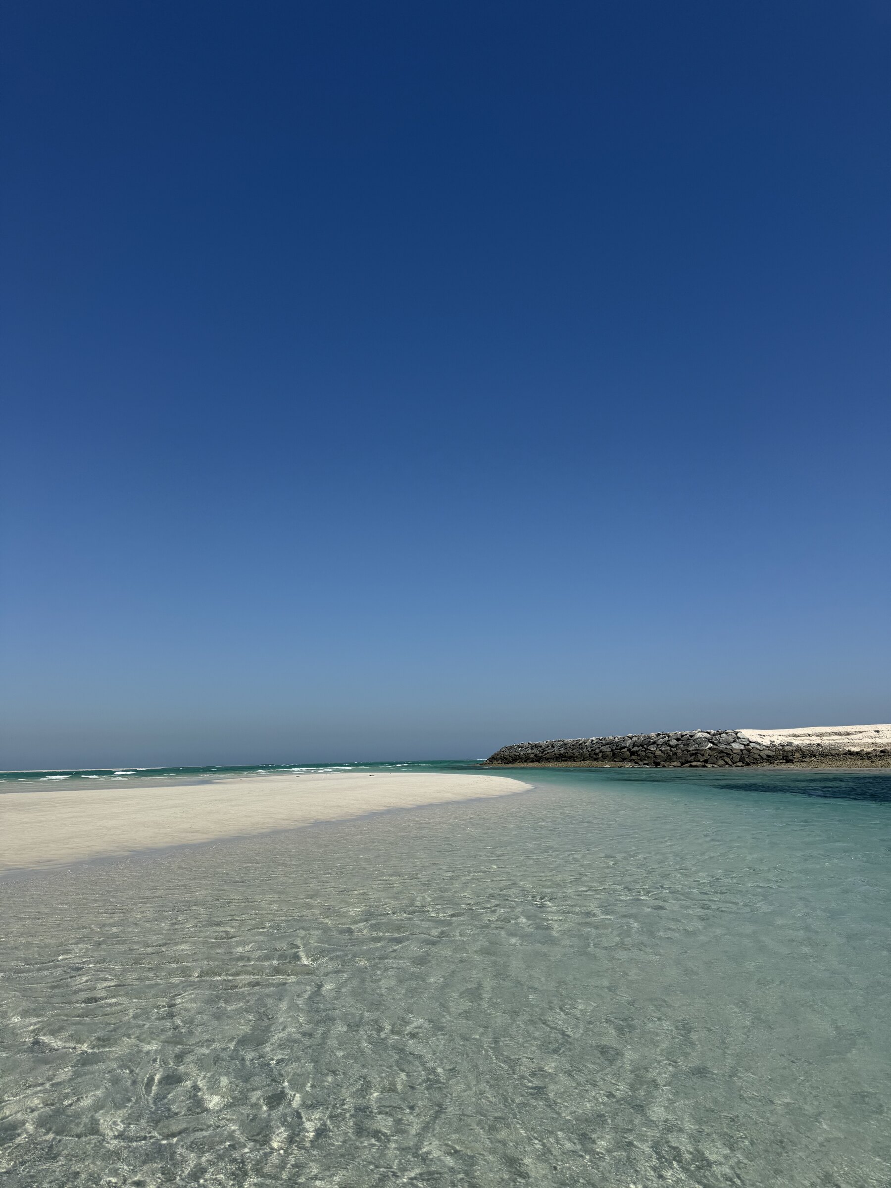 Turquoise lagoon in the shallows off Al Futaisi, Abu Dhabi