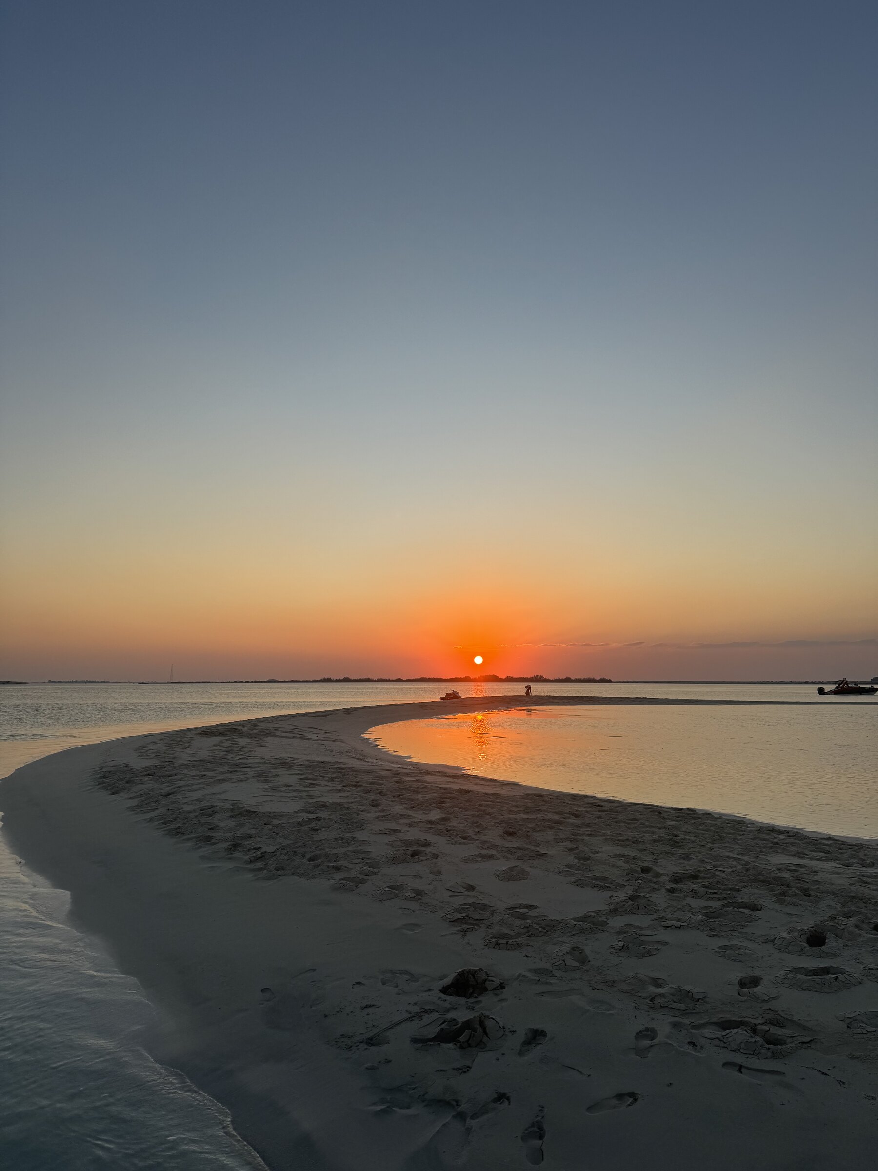 Golden sunset trail across the water